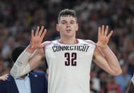 Connecticut Huskies center Donovan Clingan (32) celebrates defeating the Purdue Boilermakers in the national championship. Photo Credit: Imagn
